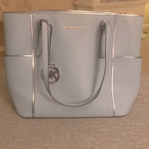 Micheal Kors leather tote in slate blue. Good condition.